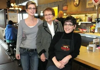 Debbie McTimmonds, Dolores Heuvel, Susan Holman behind the counter at Pop’s